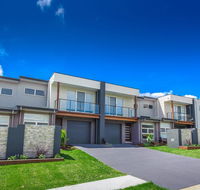 Escape At Nobbys Executive Townhouse 1 74 Pacific Drive - Seniors Australia